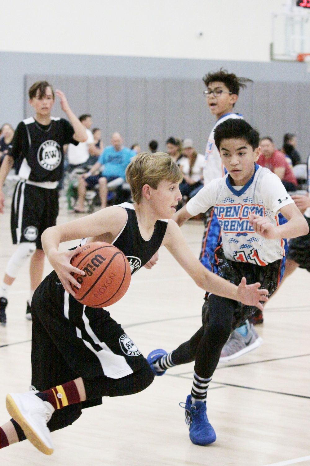 boy playing basketball